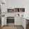 a kitchen with white cabinets